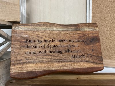 Laser engraved live edge wooden slab with Malachi 4:2 Bible verse