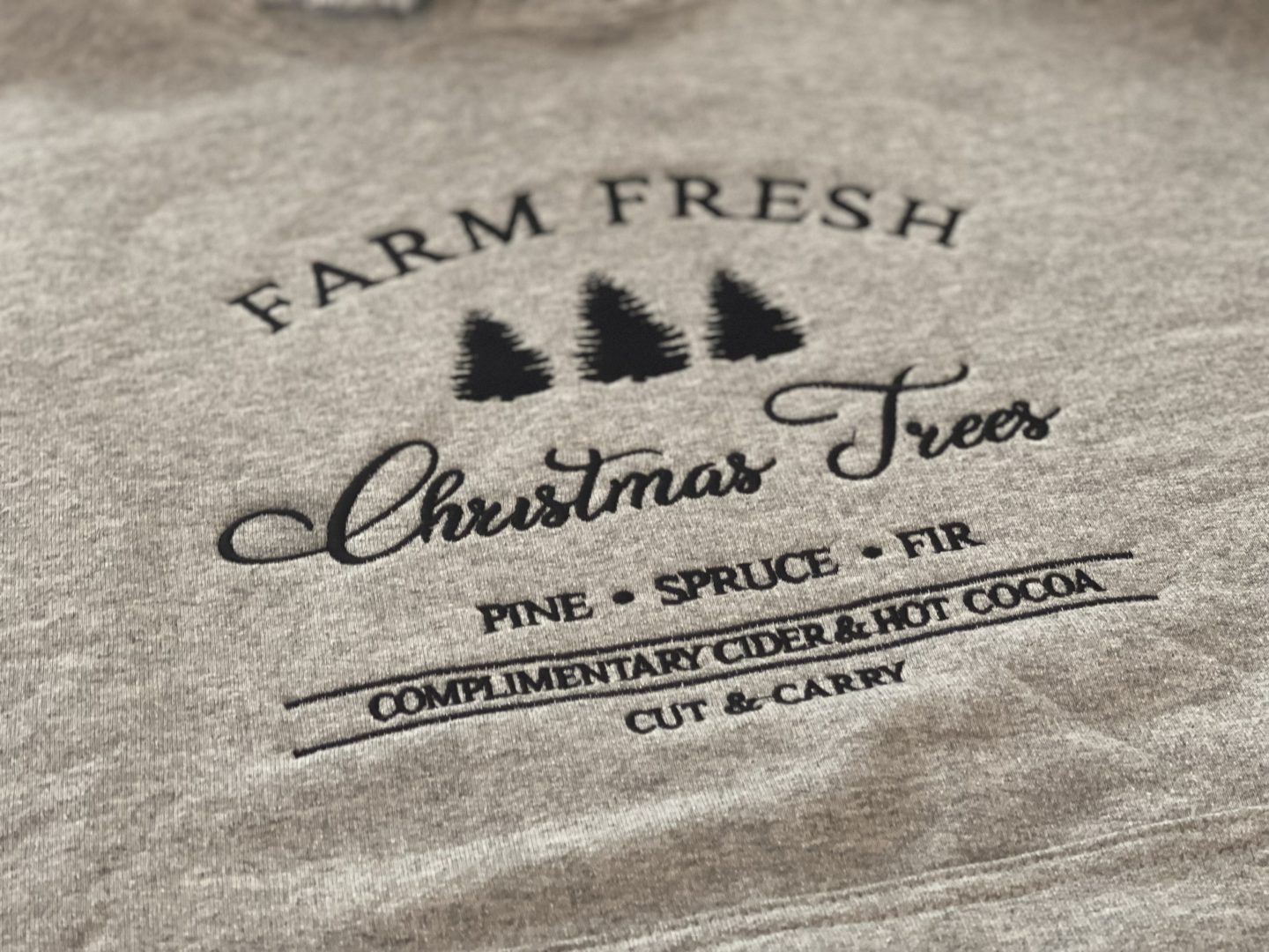 Gray sweatshirt with screen printed Farm Fresh Christmas Trees vintage holiday design