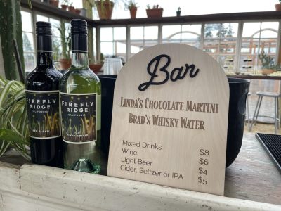 Laser engraved wooden bar menu sign with signature drinks Lindas Chocolate Martini Brads Whisky Water wedding
