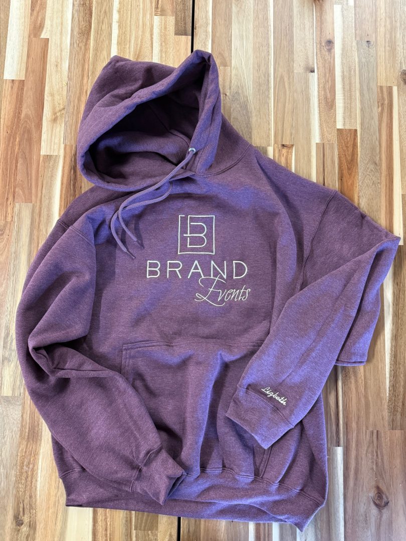 Heather plum hoodie with screen printed Brand Events logo and personalized name on sleeve cuff