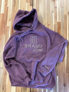 Heather plum hoodie with screen printed Brand Events logo and personalized name on sleeve cuff