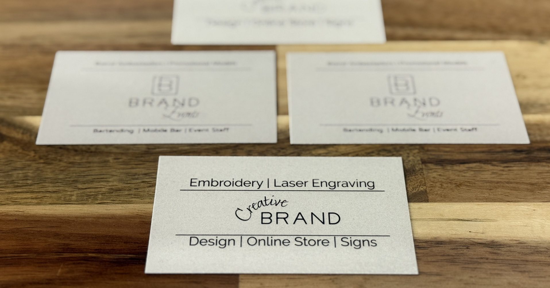 Custom printed business cards for Brand Events bartending and Creative Brand embroidery laser engraving services
